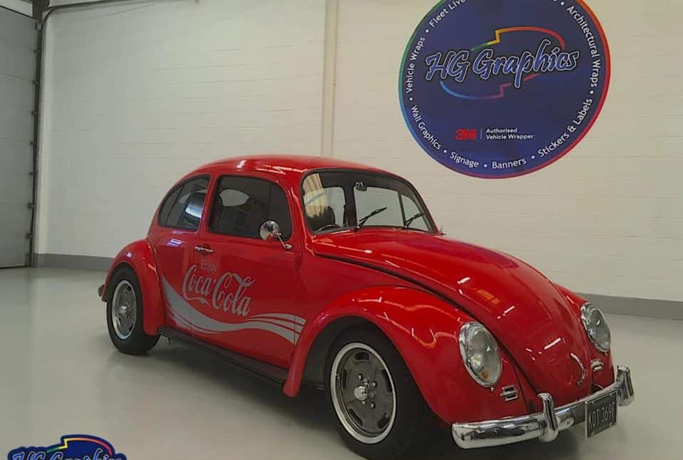 Coke cola vehicle brand wrap
