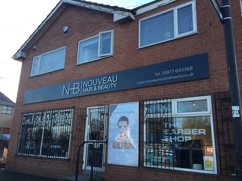 Nouveau Shopfront signage