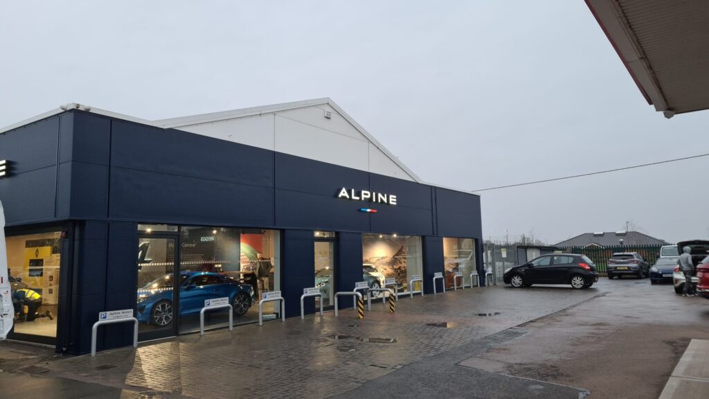 Another angle of the exterior cladding installed to a car showroom.
