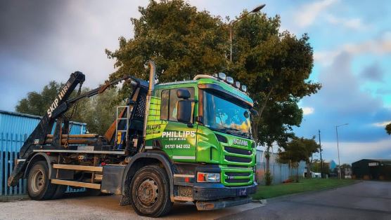 Phillips skip truck wrap side view