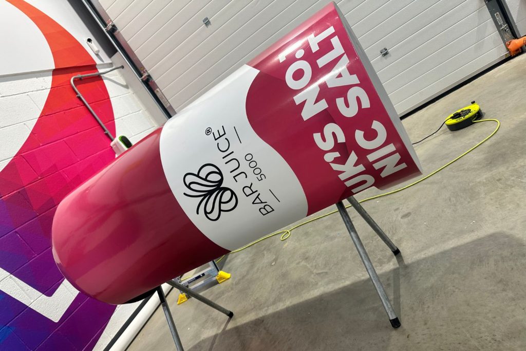 Active Hire Vape Bottle signage