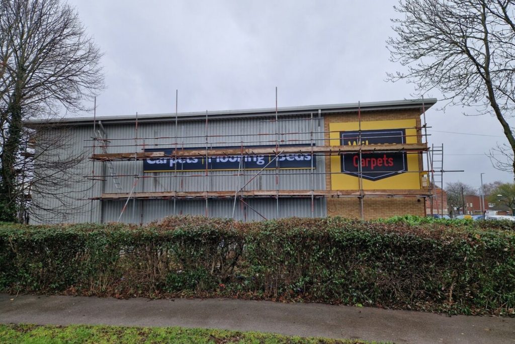 Wilsons Carpets Worksop brand signage installation